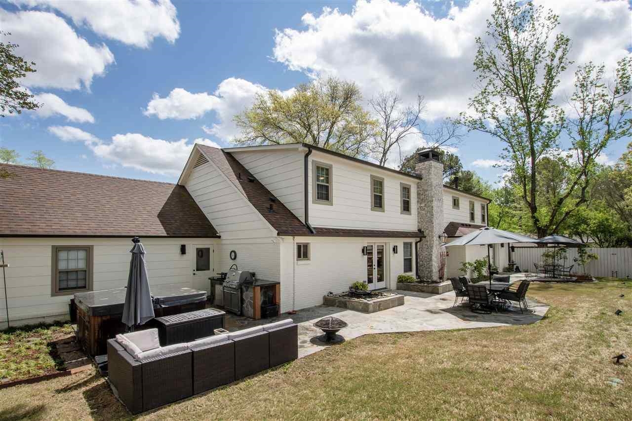 1911 Brierbrook Road Germantown, TN 38138 - Photo 26 of 26 a view of a patio with couches fire pit and a barbeque