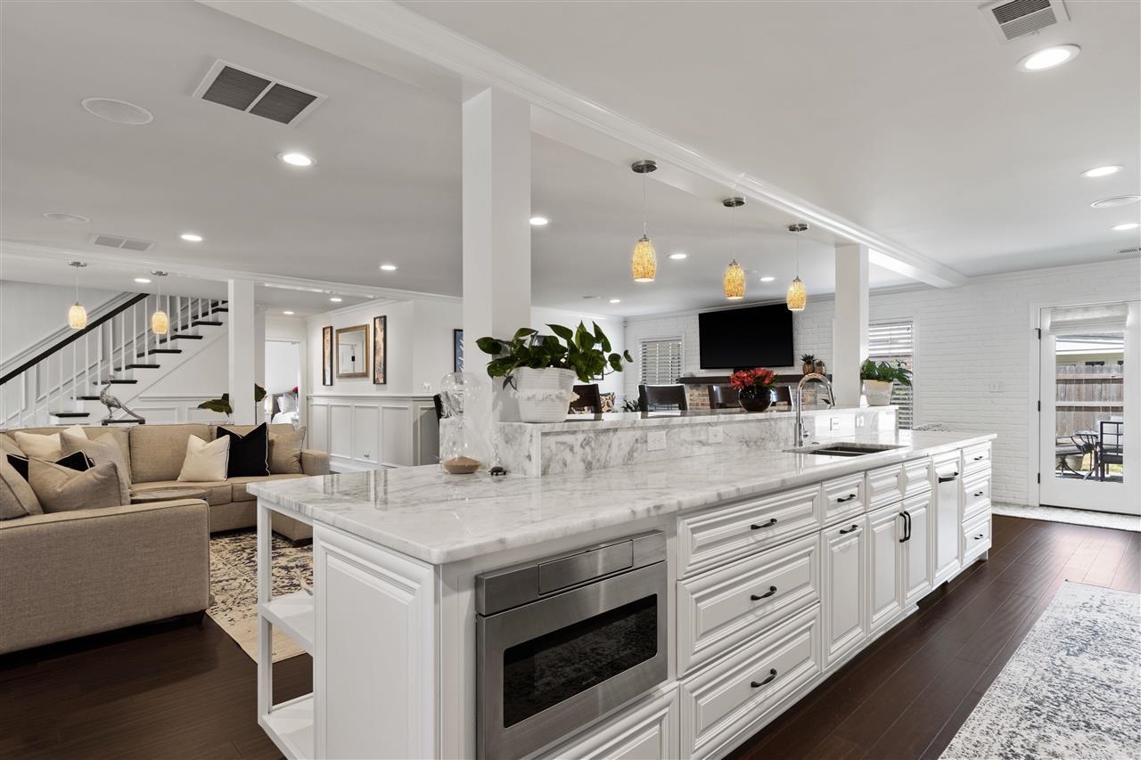 1911 Brierbrook Road Germantown, TN 38138 - Photo 5 of 26 a view of living room with granite countertop furniture and flat screen tv