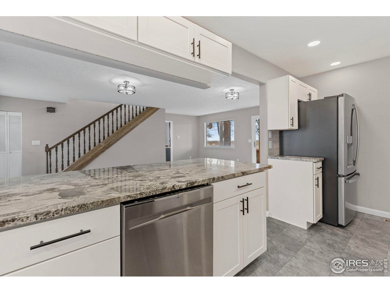 17217 County Road 86 Pierce, CO 80650 - Photo 12 of 49 a kitchen with a sink and refrigerator
