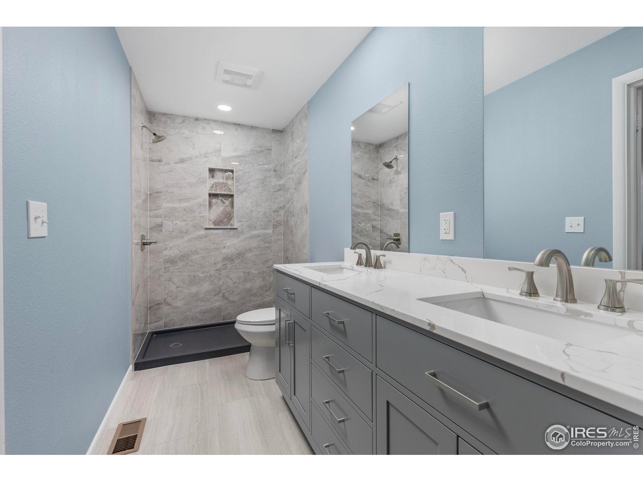 17217 County Road 86 Pierce, CO 80650 - Photo 18 of 49 a bathroom with a sink a toilet and shower