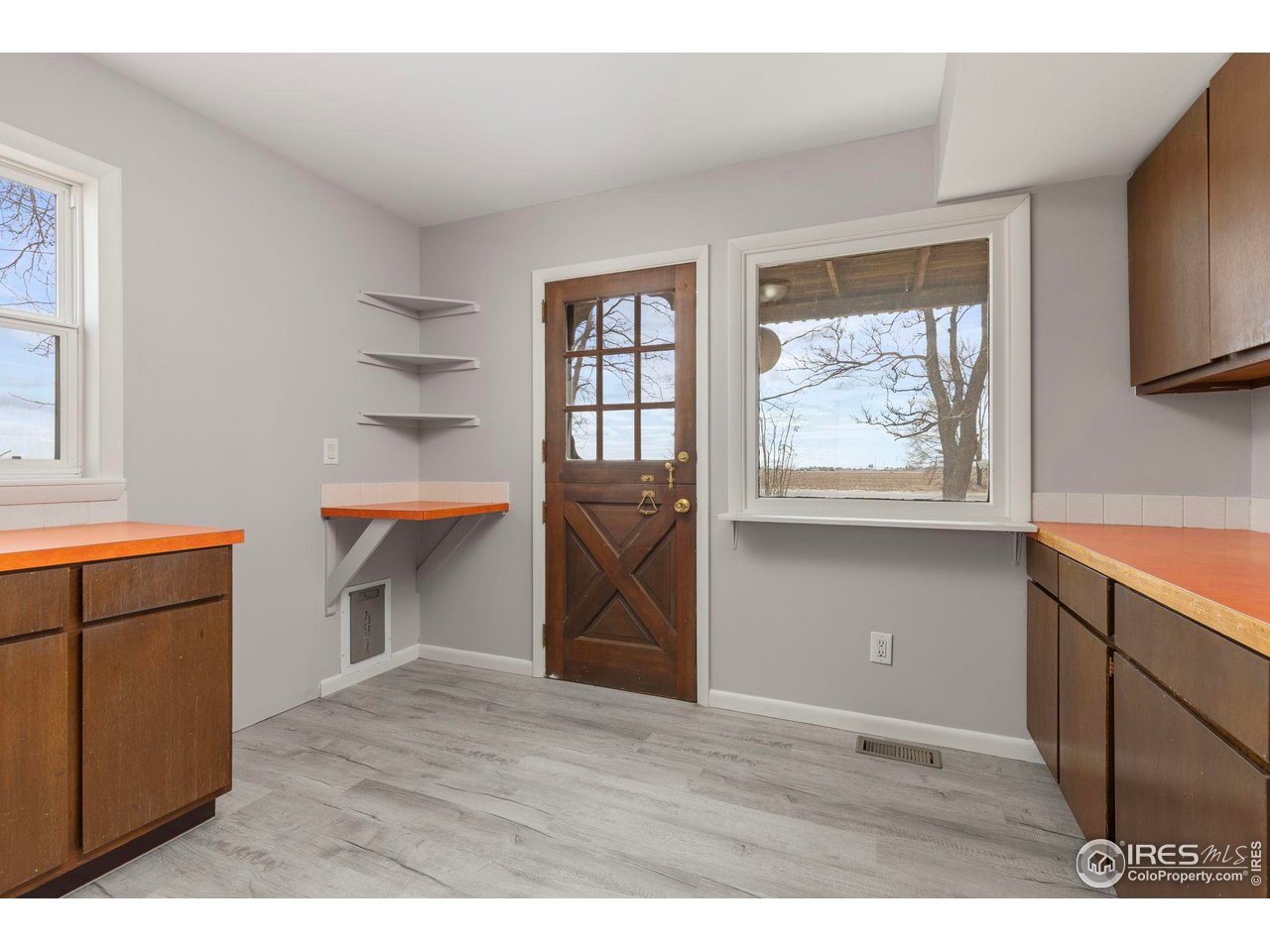 17217 County Road 86 Pierce, CO 80650 - Photo 20 of 49 a view of room with window and wooden floor