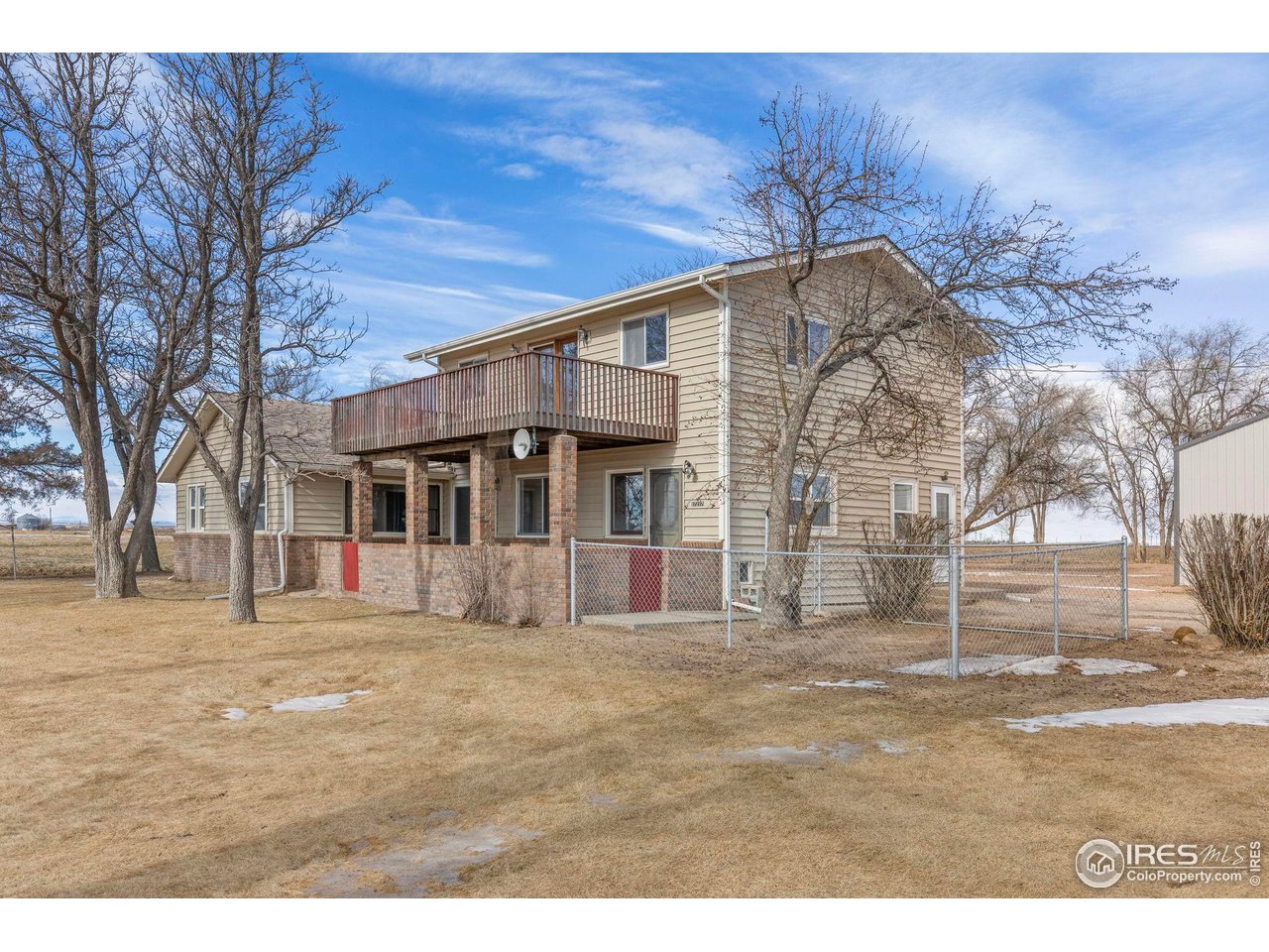 17217 County Road 86 Pierce, CO 80650 - Photo 2 of 49 a view of a house with a yard