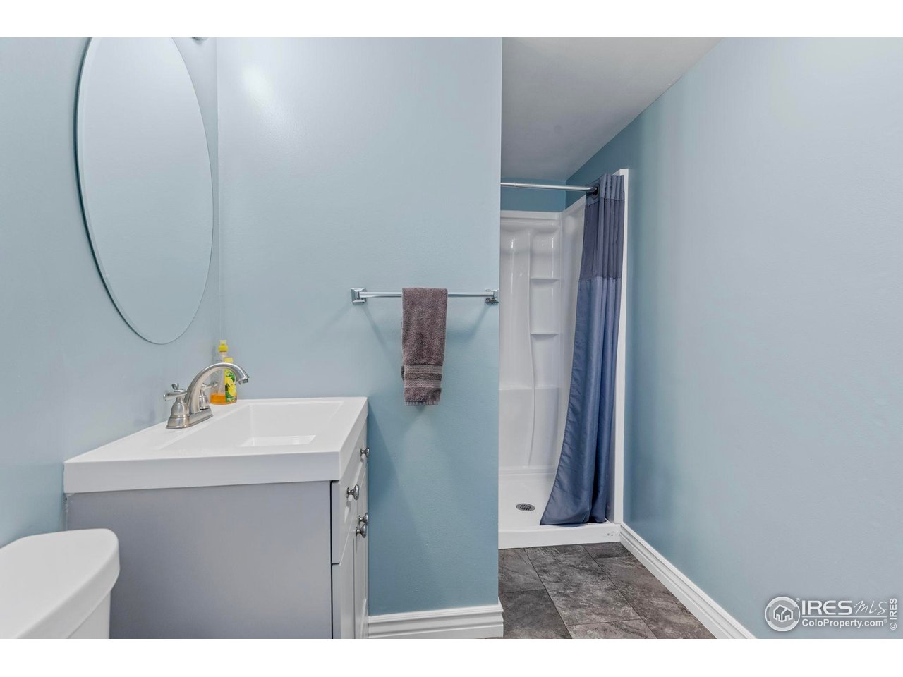 17217 County Road 86 Pierce, CO 80650 - Photo 22 of 49 a bathroom with a sink toilet and mirror
