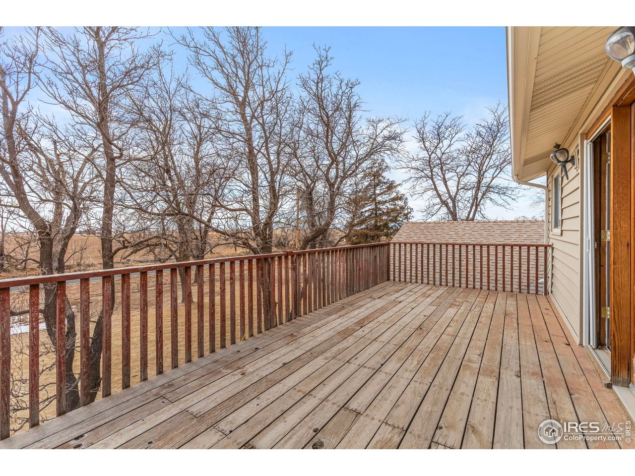 17217 County Road 86 Pierce, CO 80650 - Photo 29 of 49 a view of backyard with a deck