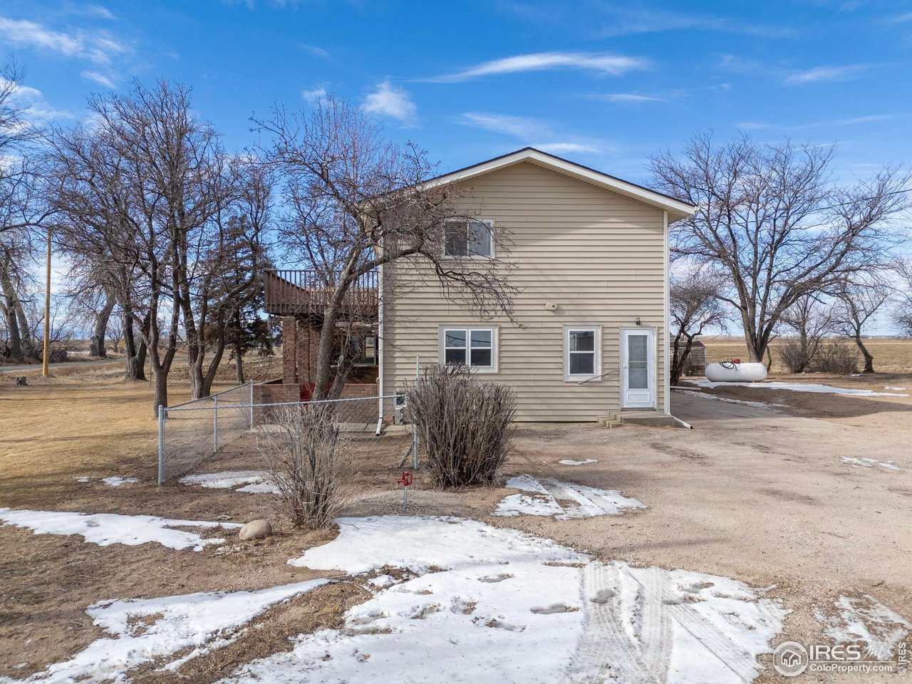 17217 County Road 86 Pierce, CO 80650 - Photo 32 of 49 a view of a house with a yard