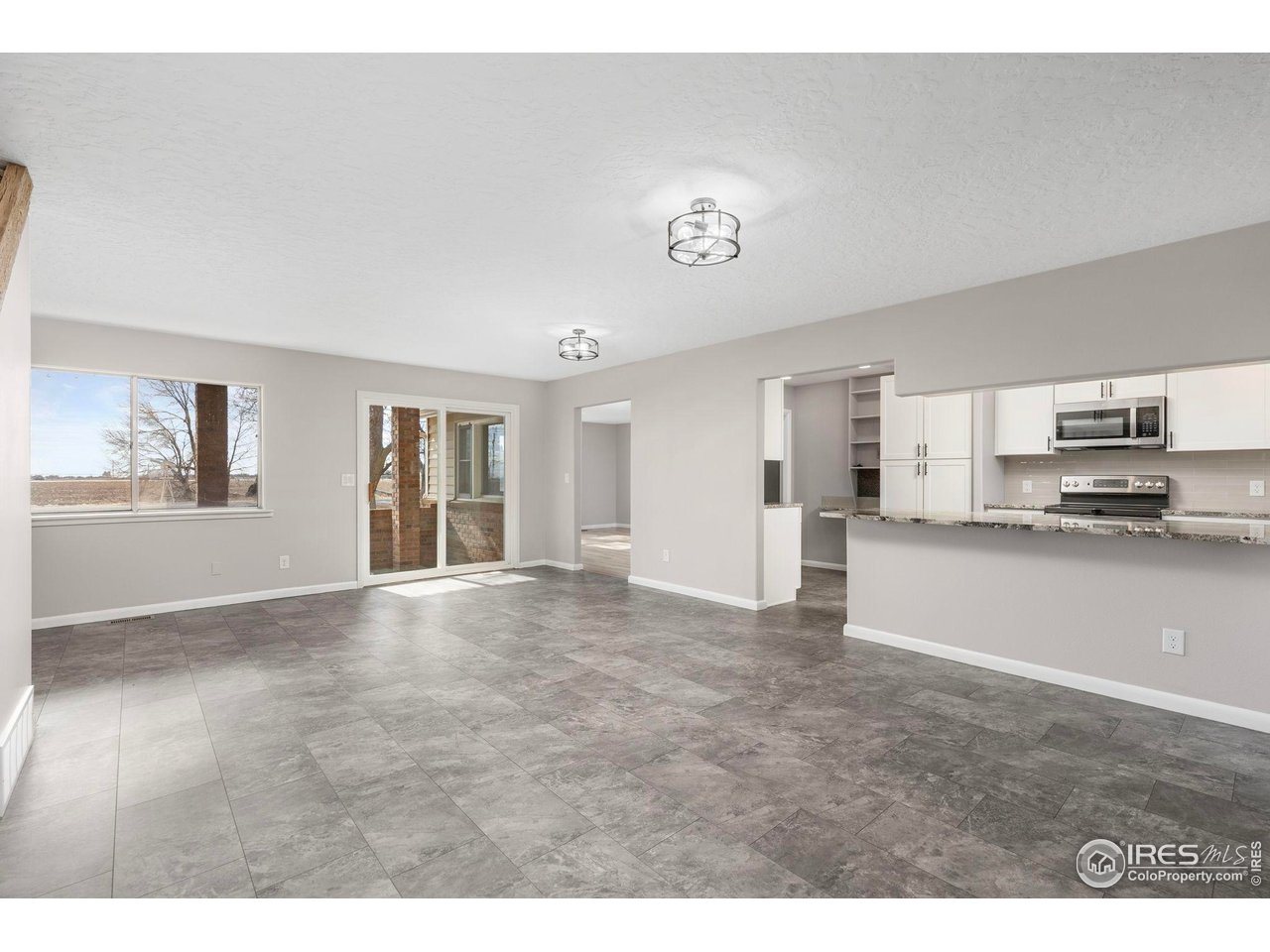 17217 County Road 86 Pierce, CO 80650 - Photo 7 of 49 a view of an empty room with a window