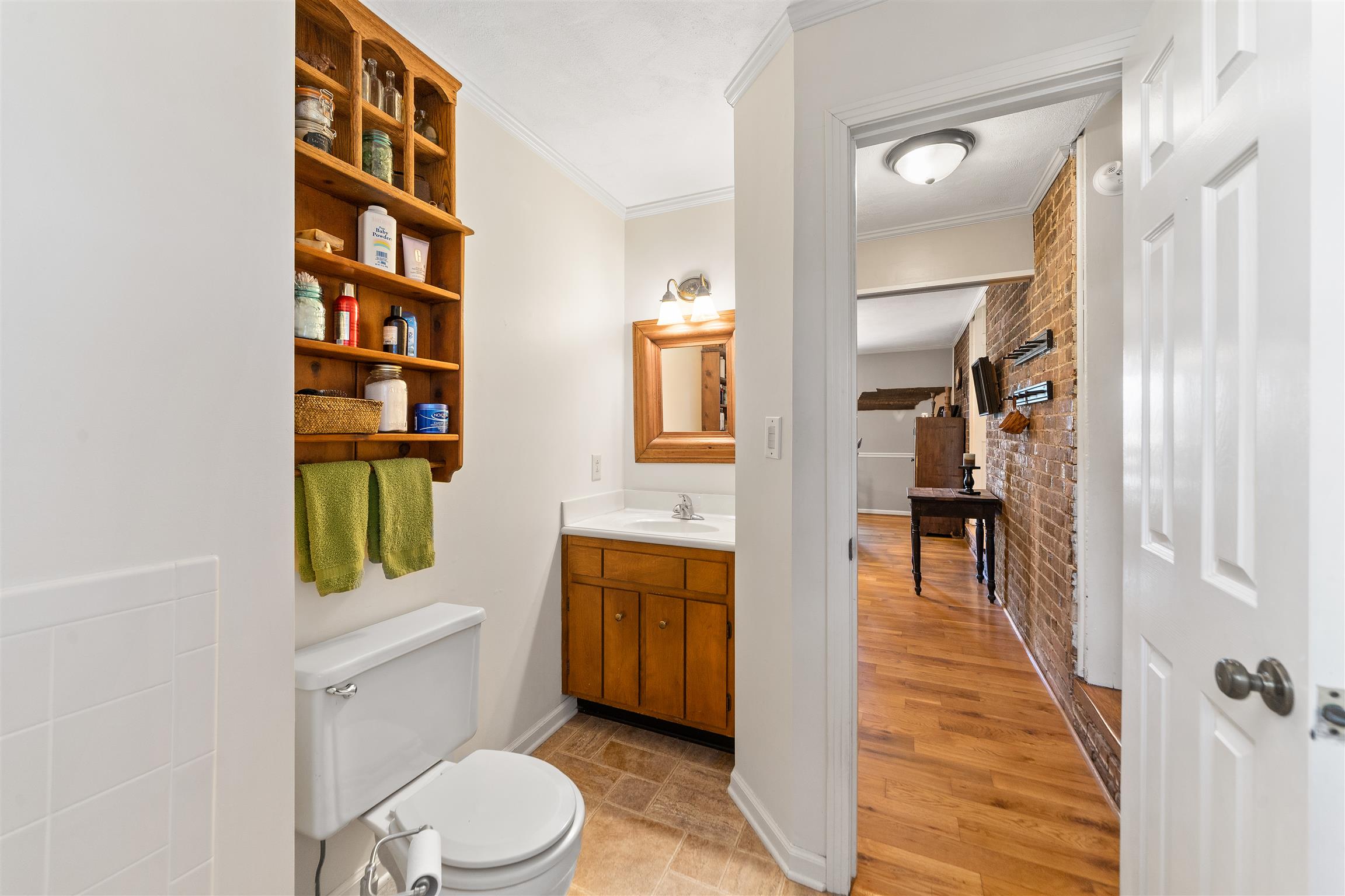 3248 Marthas Chapel Road Cunningham, TN 37052 - Photo 11 of 30 a bathroom with a sink a toilet and shower