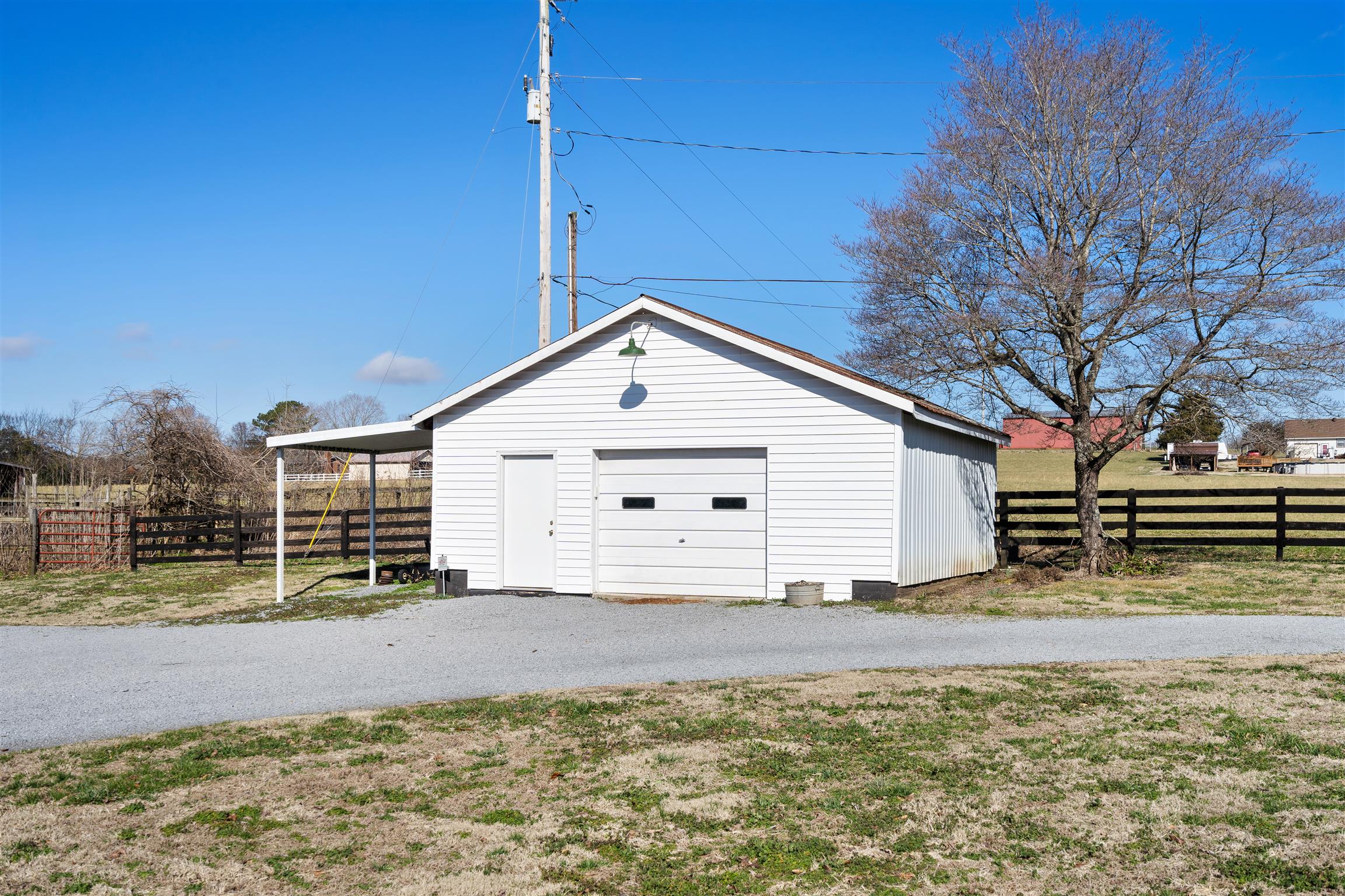3248 Marthas Chapel Road Cunningham, TN 37052 - Photo 22 of 30 a view of a house with a yard