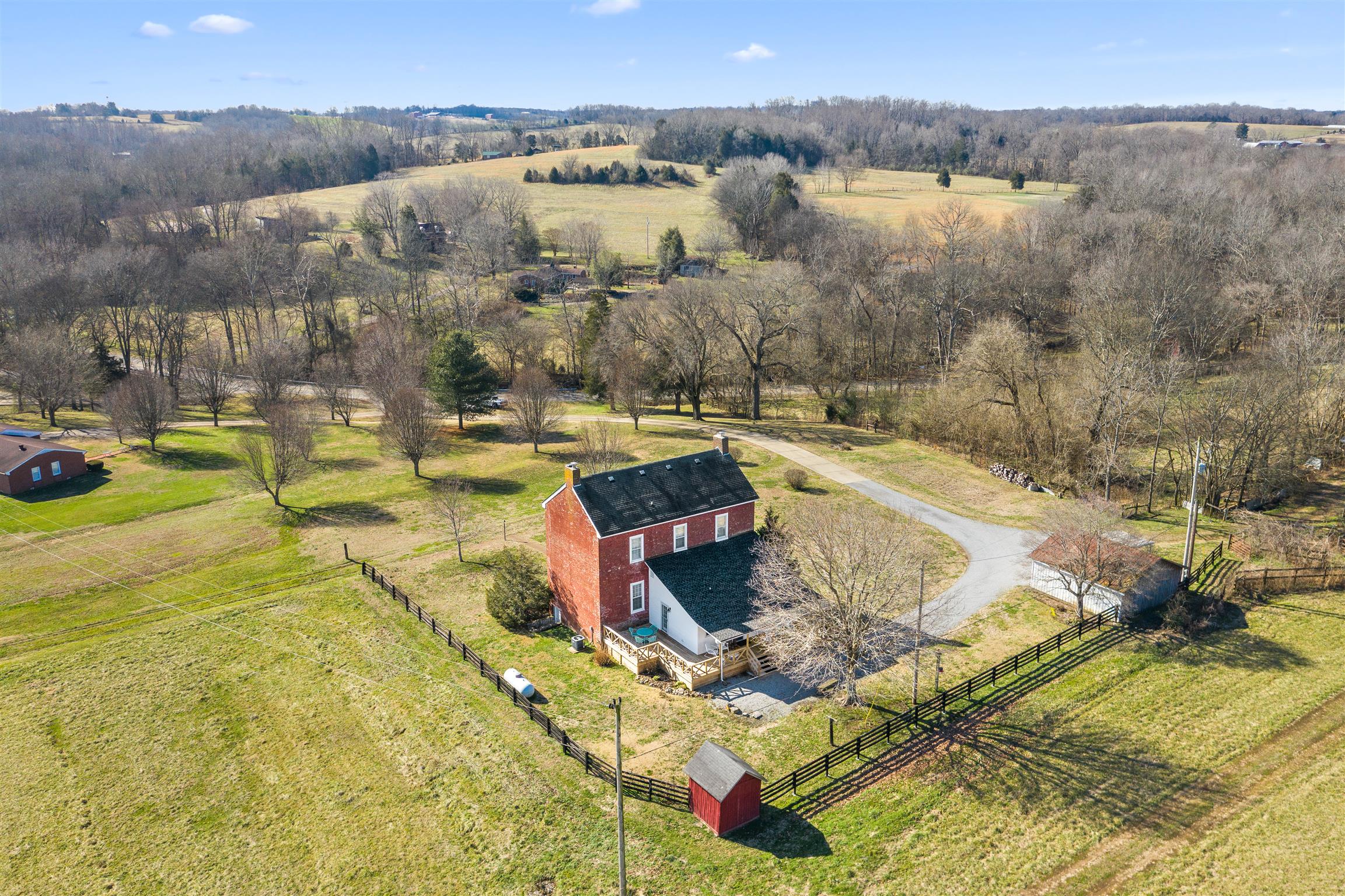 3248 Marthas Chapel Road Cunningham, TN 37052 - Photo 28 of 30 a view of a lake with a yard