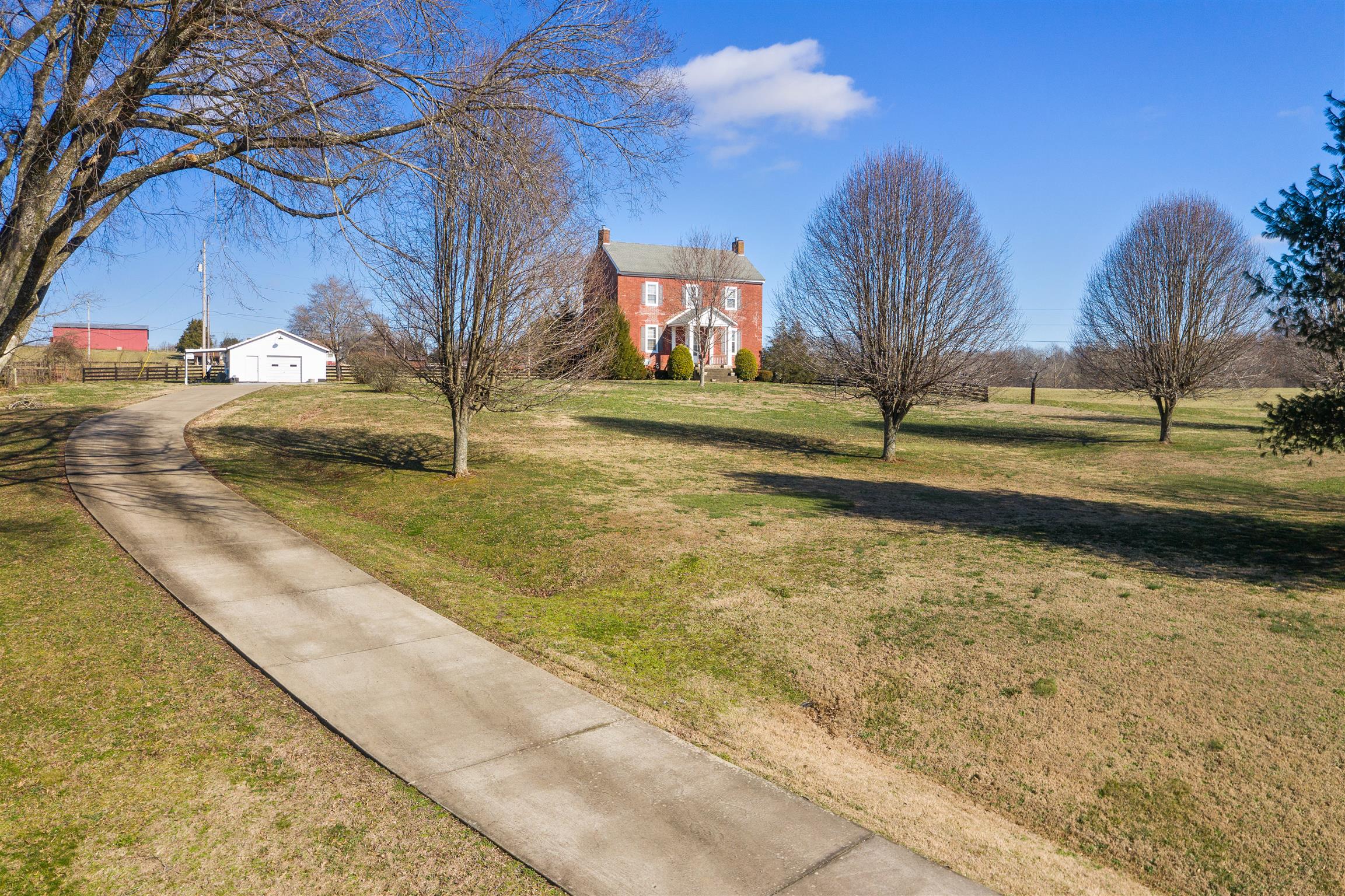 3248 Marthas Chapel Road Cunningham, TN 37052 - Photo 30 of 30 a view of a yard with large trees