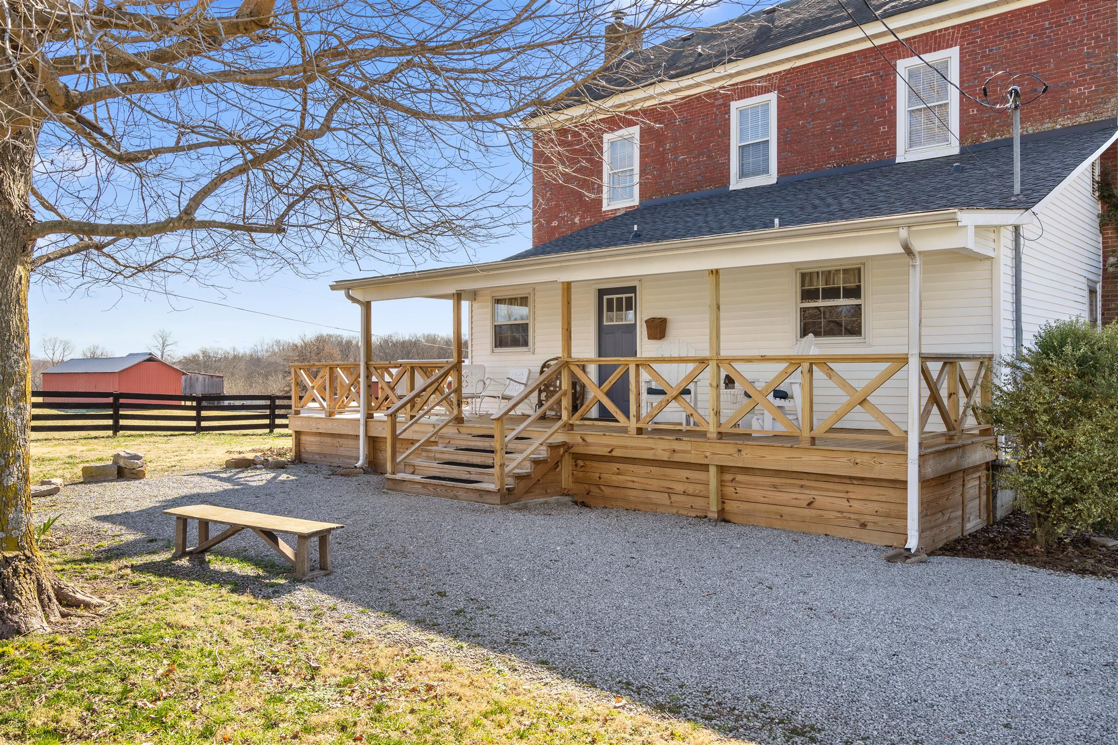 3248 Marthas Chapel Road Cunningham, TN 37052 - Photo 4 of 30 a view of a house with backyard porch and sitting area