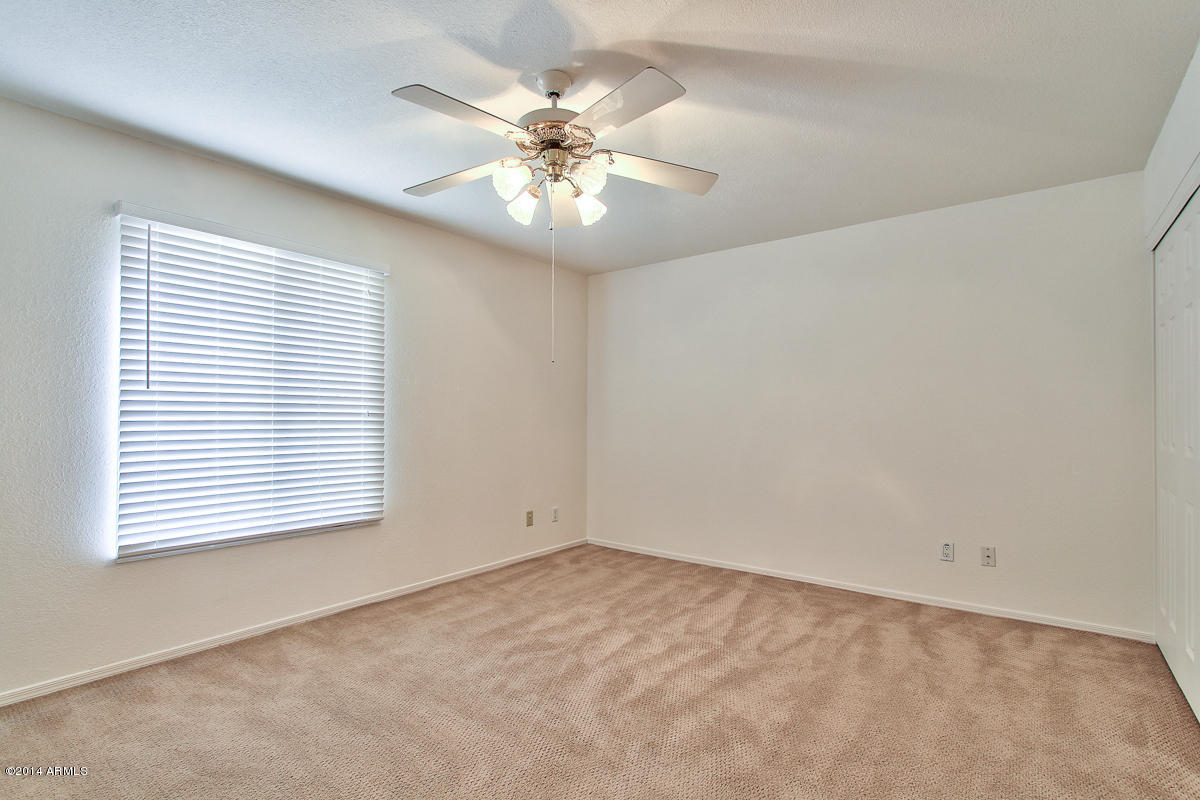 4123 West Calavar Road Phoenix, AZ 85053 - Photo 14 of 24 Master Bedroom