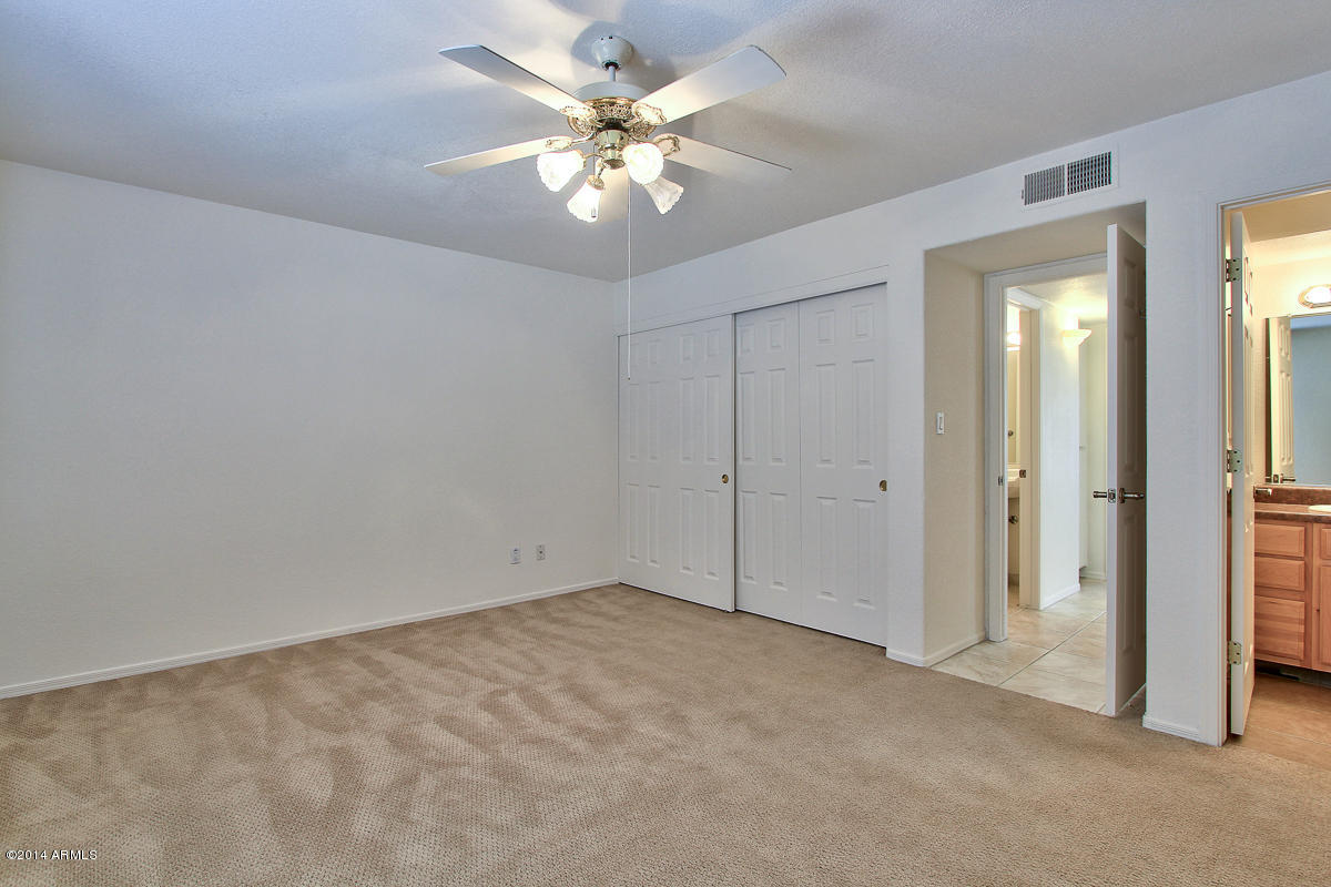 4123 West Calavar Road Phoenix, AZ 85053 - Photo 15 of 24 Master Bedroom