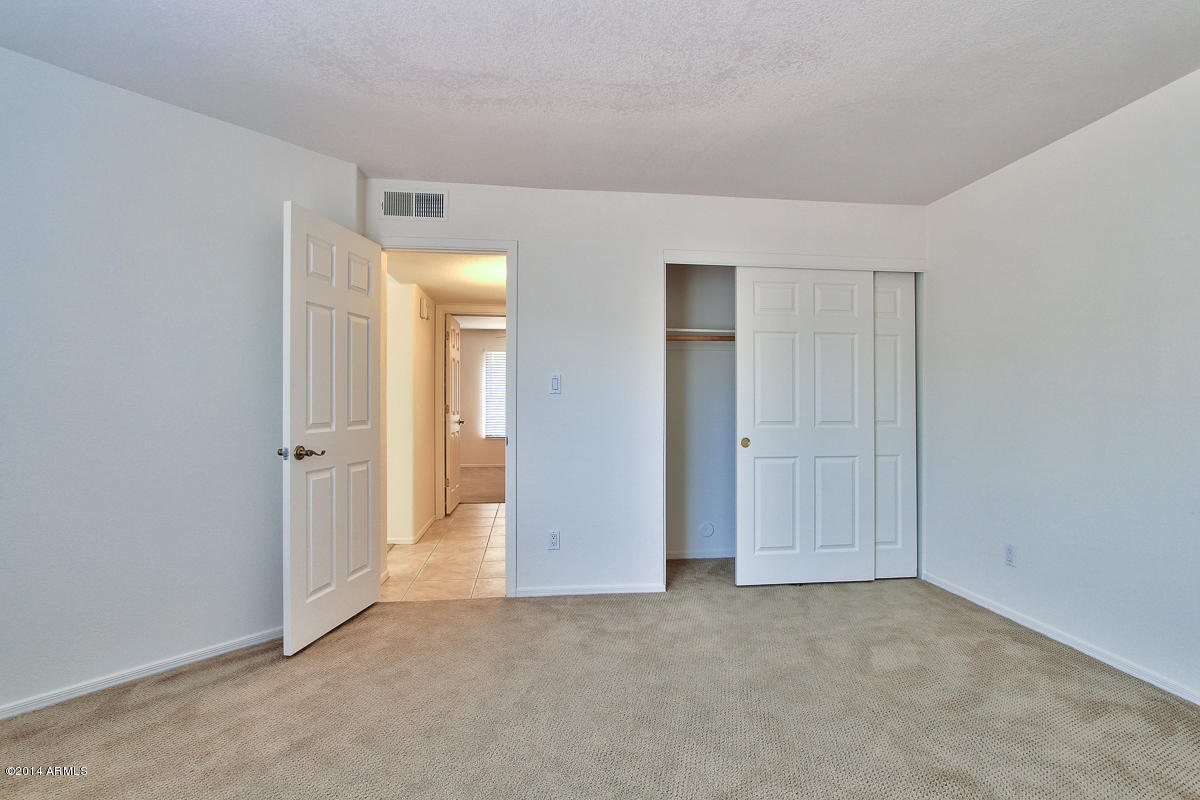 4123 West Calavar Road Phoenix, AZ 85053 - Photo 17 of 24 Guest Bedroom