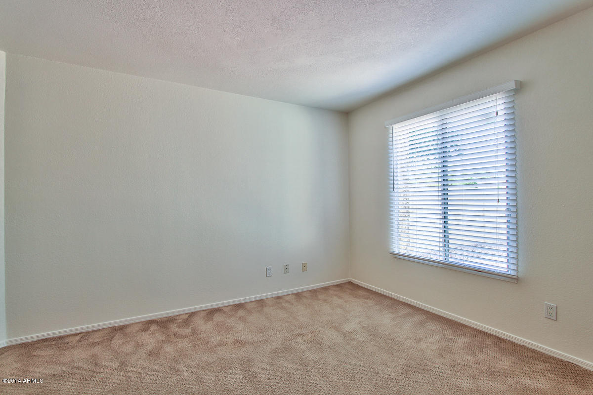 4123 West Calavar Road Phoenix, AZ 85053 - Photo 18 of 24 Guest Bedroom