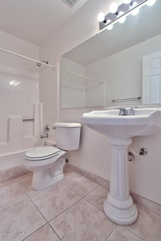 4123 West Calavar Road Phoenix, AZ 85053 - Photo 19 of 24 Guest Bathroom