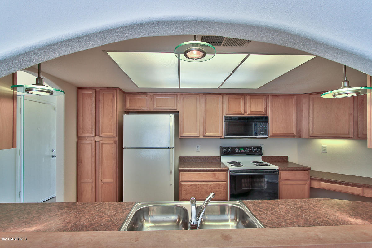4123 West Calavar Road Phoenix, AZ 85053 - Photo 7 of 24 Kitchen