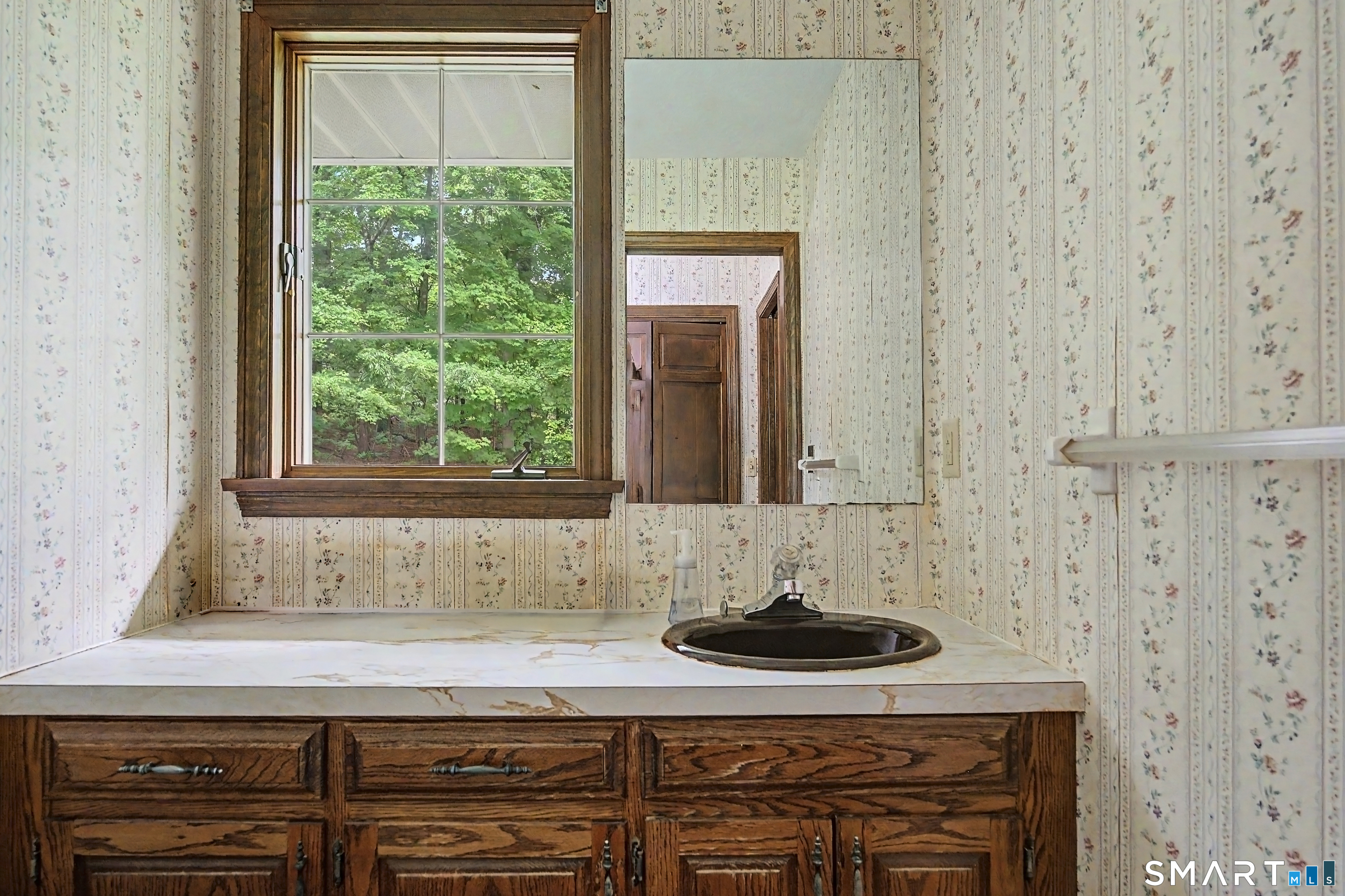 370 Hubbard Road Haddam, CT 06441 - Photo 12 of 39 Half bath off of the kitchen and front entry.