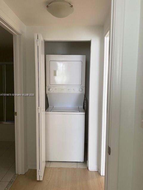 2775 Northeast 187th Street, Unit 407 Aventura, FL 33180 - Photo 26 of 38 washer and dryer in the unit