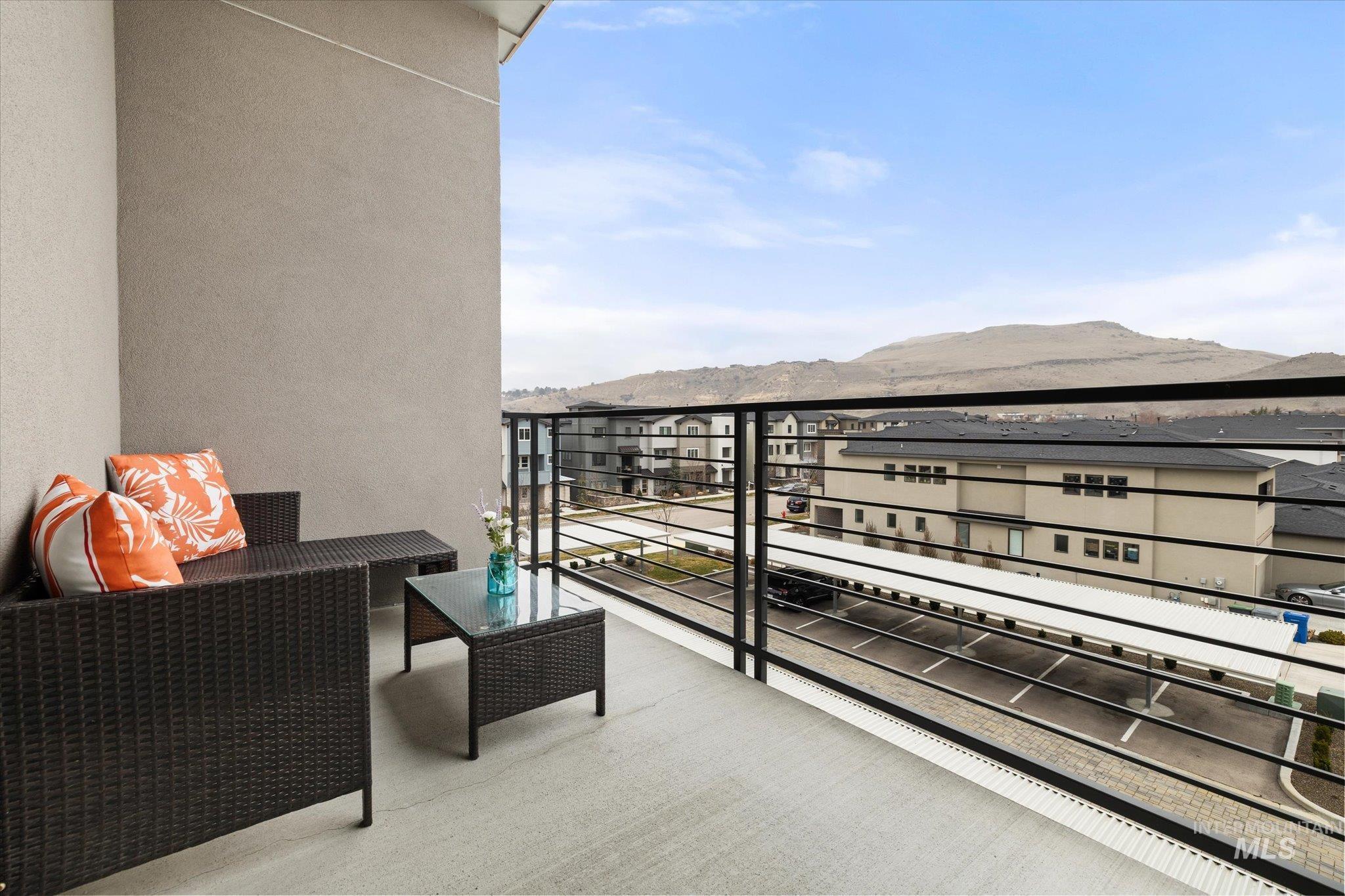 3850 East Haystack Street, Unit 302 Boise, ID 83716 - Photo 8 of 47 Balcony featuring a mountain view
