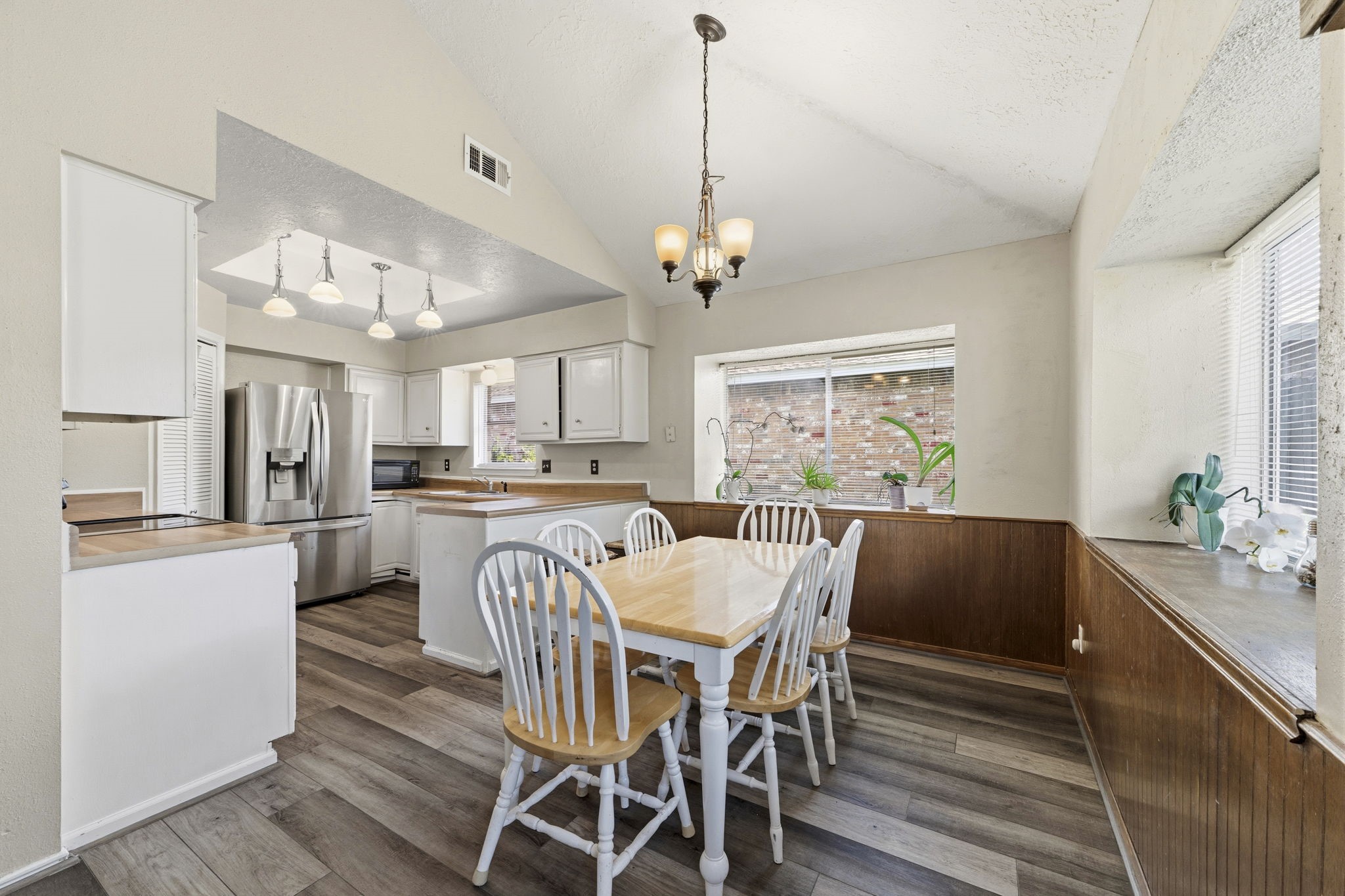 5603 Lynngate Drive Spring, TX 77373 - Photo 10 of 35 Spacious Dining room features bay windows & vaulted ceiling