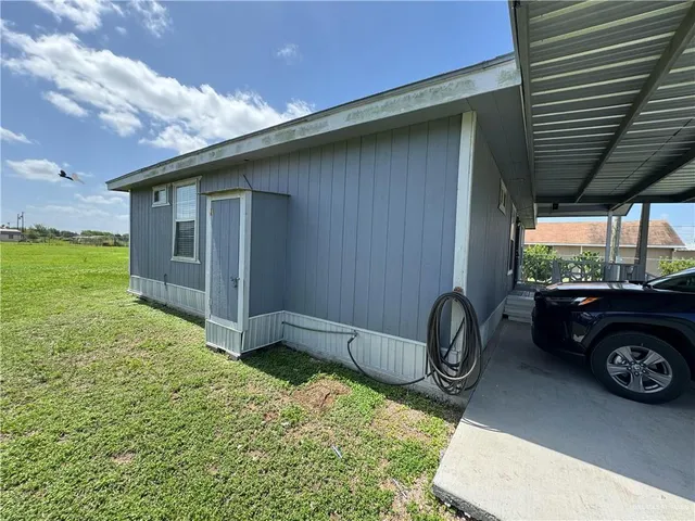a car parked in front of a house
