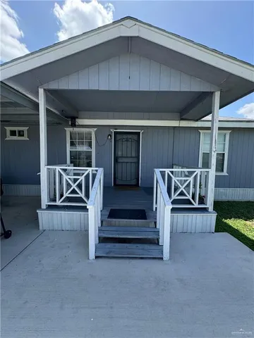 a view of livingroom with furniture and staircase