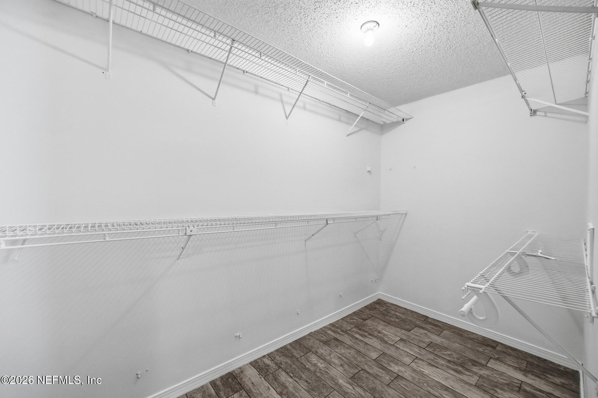 969 Alpine Ridge Court Orange Park, FL 32065 - Photo 18 of 26 a view of a room with racks on the wall