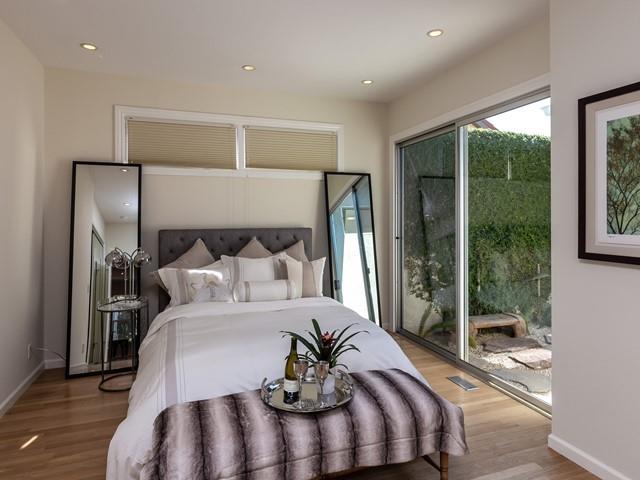 79 Del Prado Drive Campbell, CA 95008 - Photo 21 of 34 a bedroom with a bed and a large window