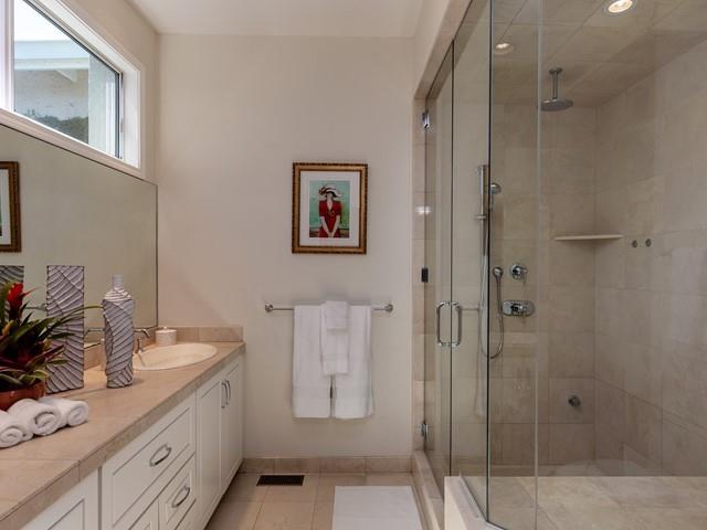 79 Del Prado Drive Campbell, CA 95008 - Photo 23 of 34 a bathroom with a granite countertop sink mirror and shower