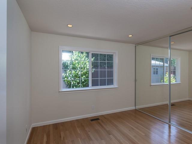 79 Del Prado Drive Campbell, CA 95008 - Photo 28 of 34 a view of an empty room with wooden floor and a window