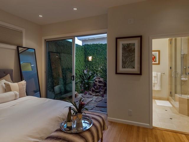 79 Del Prado Drive Campbell, CA 95008 - Photo 8 of 34 a bedroom with a bed and a large window