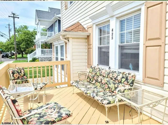 a view of a swimming pool with a lounge chairs