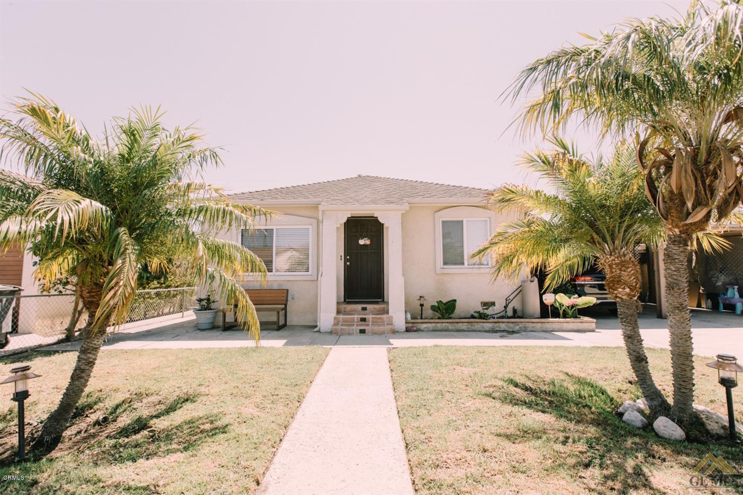 424 West Cedar Street Oxnard, CA 93033 - Photo 1 of 26 a view of a house with a yard