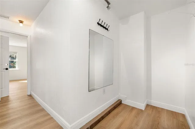 a house with trees in the background