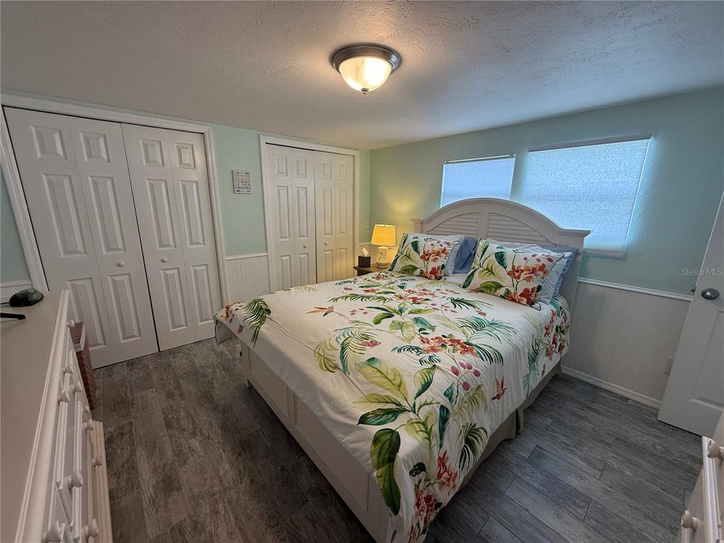 6190 Daffodil Road Venice, FL 34293 - Photo 10 of 16 a bedroom with a bed and a window