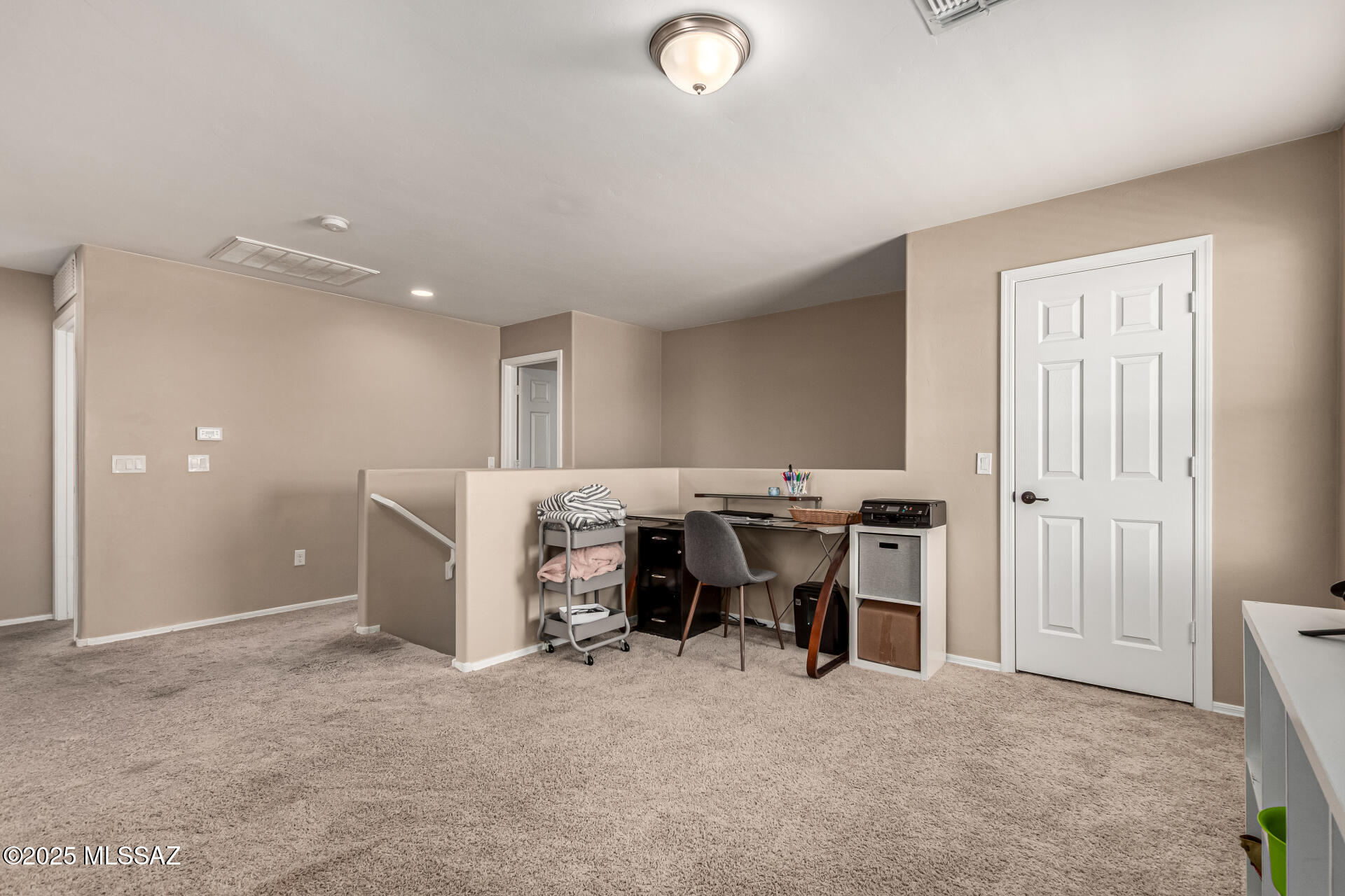 9528 Desert Fauna Loop Tucson, AZ 85747 - Photo 20 of 46 a view of work space with windows