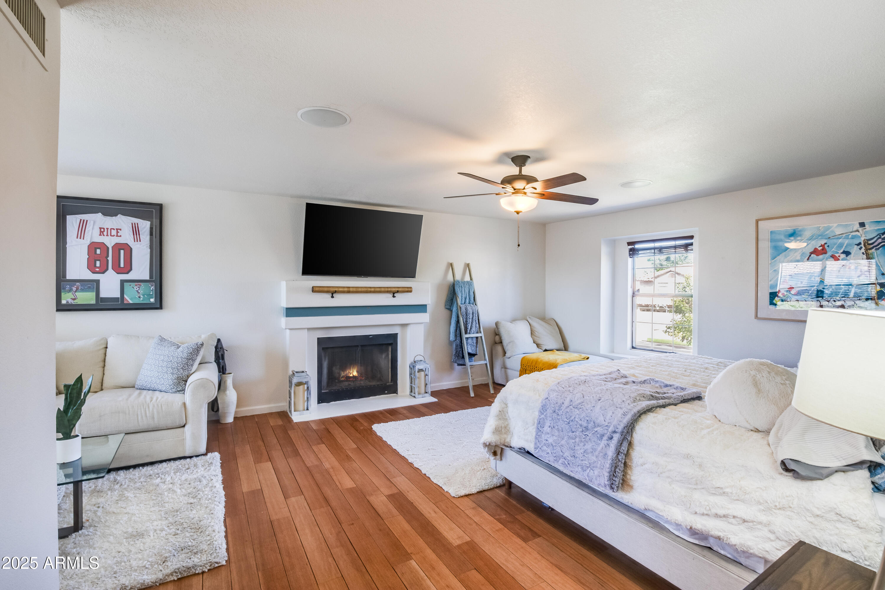 7383 West Utopia Road Glendale, AZ 85308 - Photo 12 of 18 a bedroom with a bed and a flat screen tv