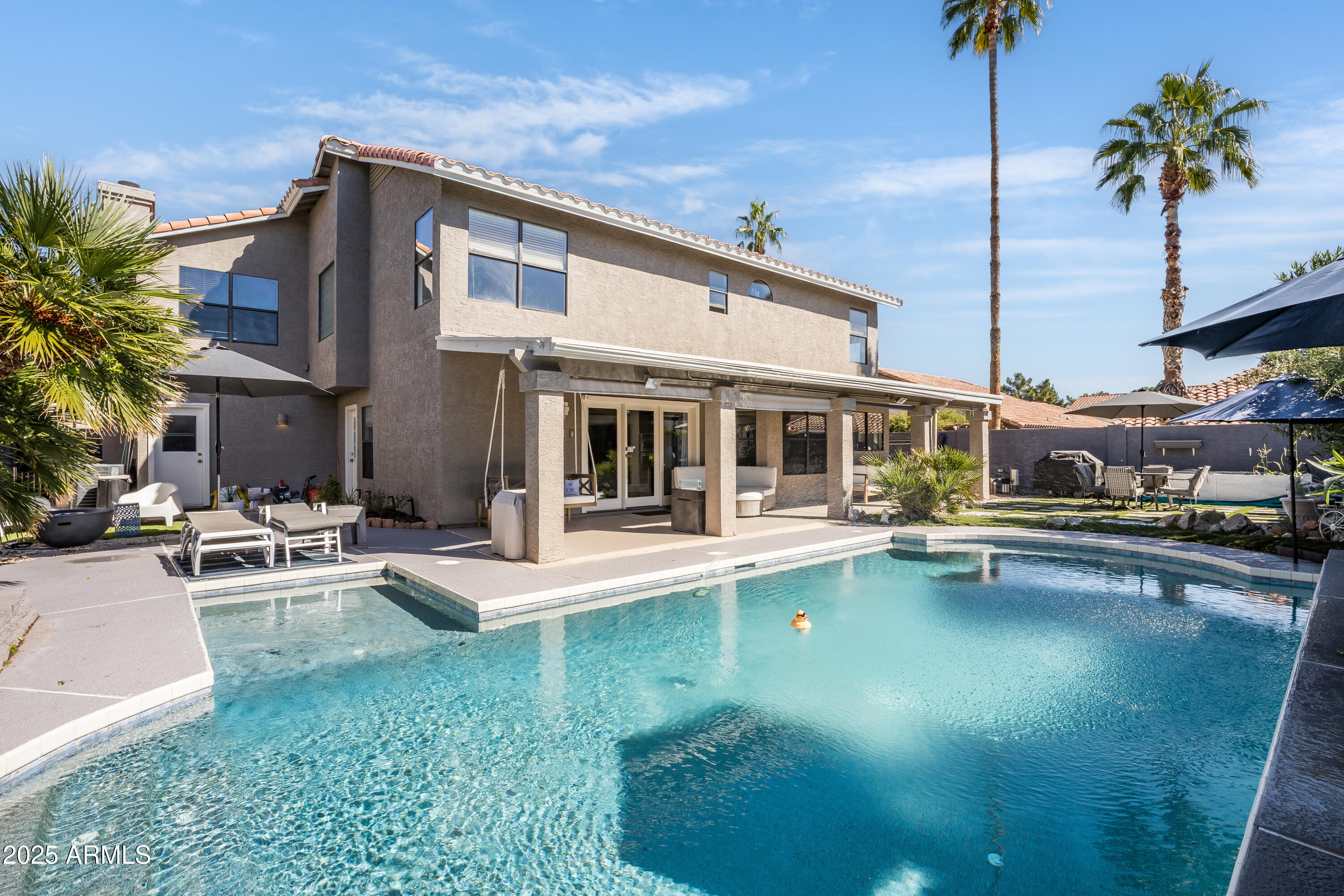 7383 West Utopia Road Glendale, AZ 85308 - Photo 3 of 18 a view of a house with swimming pool patio