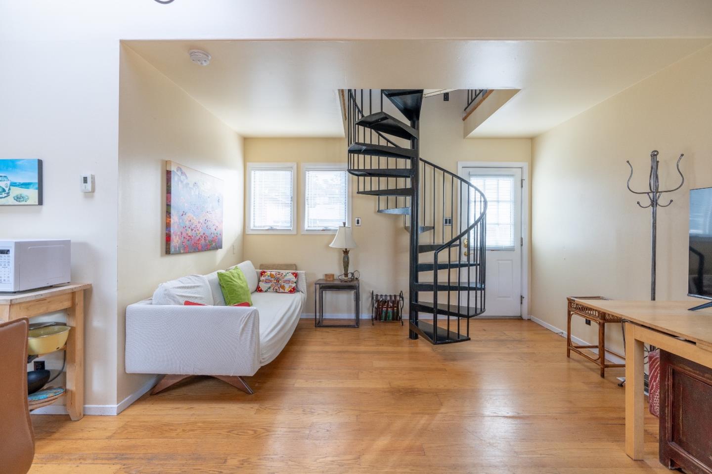 280 Brighton Road Pacifica, CA 94044 - Photo 6 of 12 a living room with furniture and a flat screen tv