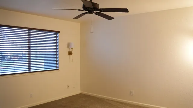 a view of a hallway with a window