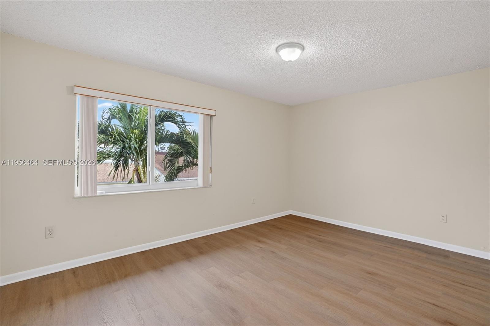 2455 Southwest 11th Street, Unit 7A Miami, FL 33135 - Photo 18 of 38 a view of a window in a room