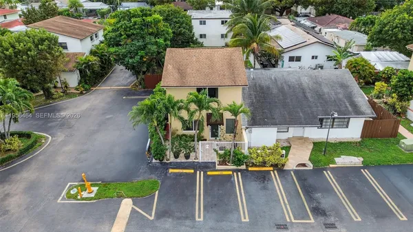an aerial view of a house with garden