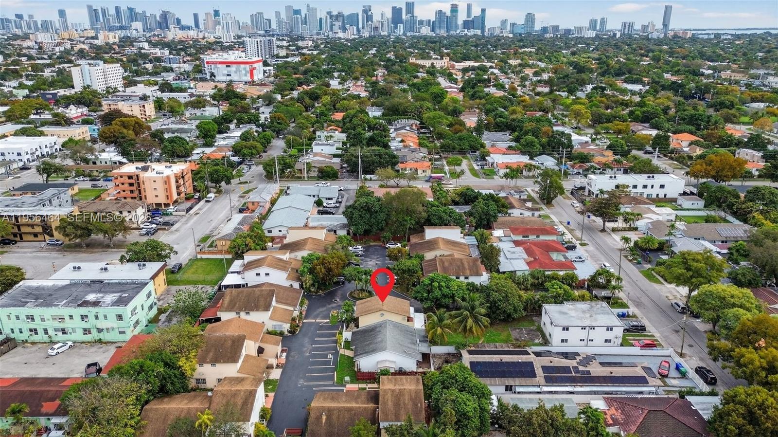 2455 Southwest 11th Street, Unit 7A Miami, FL 33135 - Photo 34 of 38 an aerial view of residential houses with outdoor space
