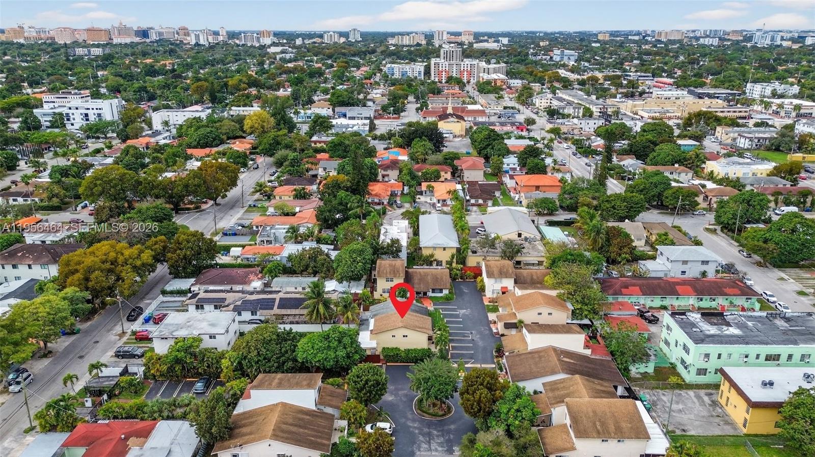 2455 Southwest 11th Street, Unit 7A Miami, FL 33135 - Photo 38 of 38 an aerial view of residential houses with city view