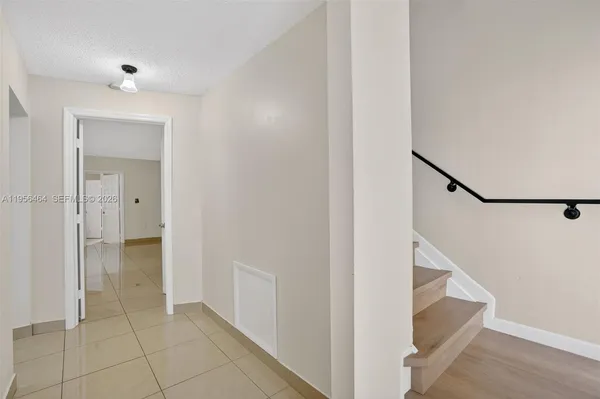 a view of an entryway with staircase