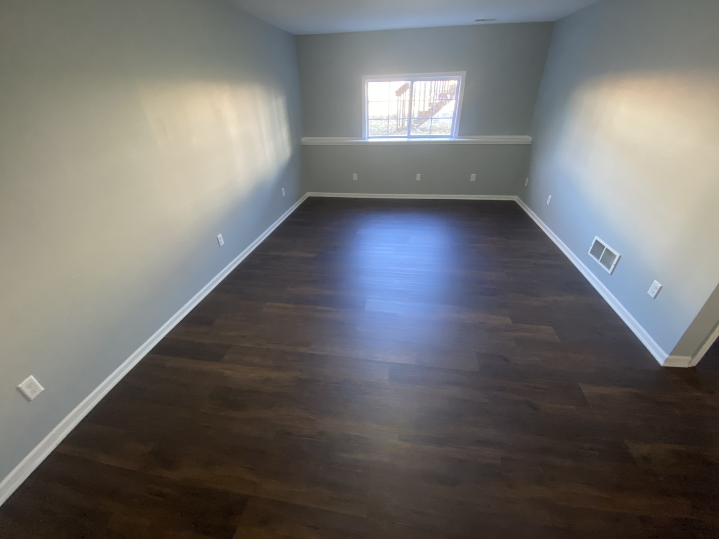 250 Parktrail Road Normal, IL 61761 - Photo 14 of 16 an empty room with wooden floor and windows