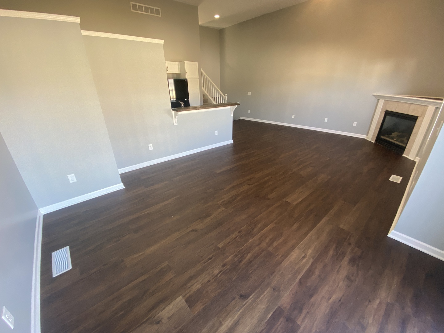 250 Parktrail Road Normal, IL 61761 - Photo 4 of 16 a view of a room with wooden floor and a sink