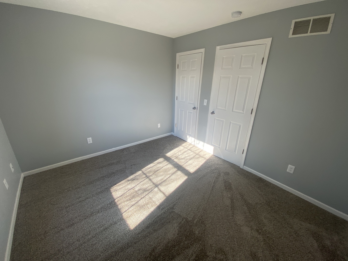 250 Parktrail Road Normal, IL 61761 - Photo 9 of 16 a view of wooden floor and windows in a room