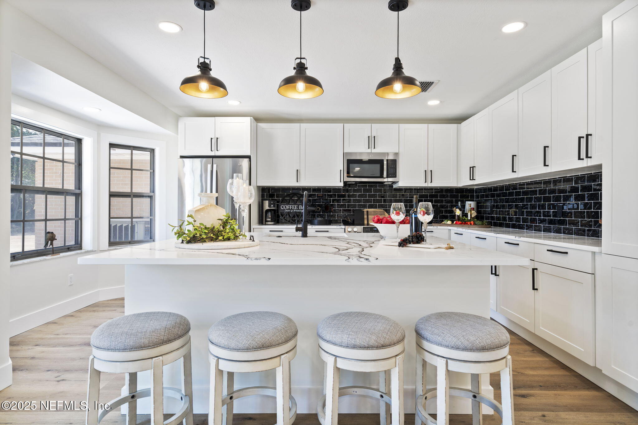 3715 Rustic Lane Jacksonville, FL 32217 - Photo 11 of 45 a kitchen with stainless steel appliances a stove a sink and cabinets